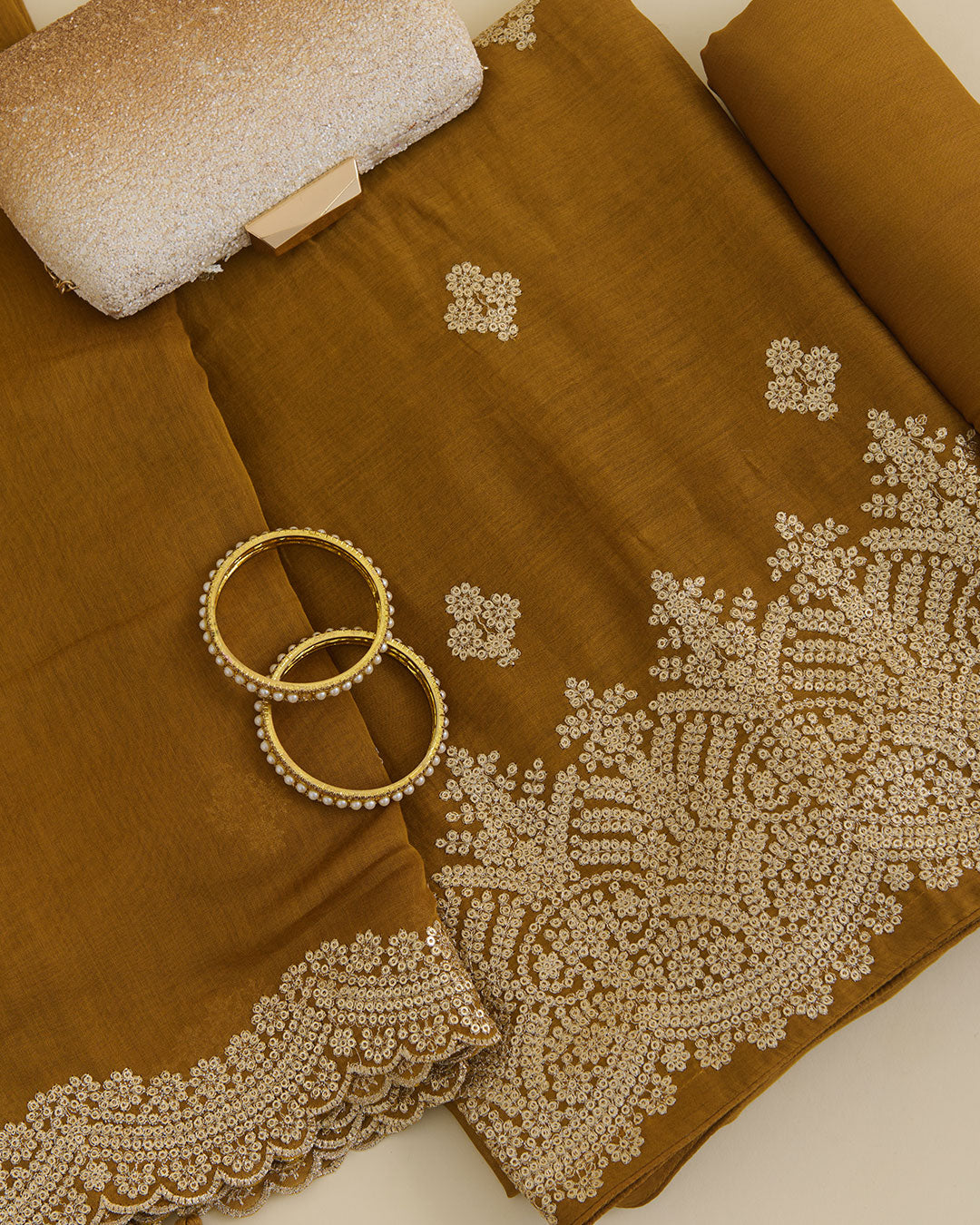 Mustard Mal Chanderi kurta with sequence zari embroidery, matching butti dupatta and shantoon bottom set
