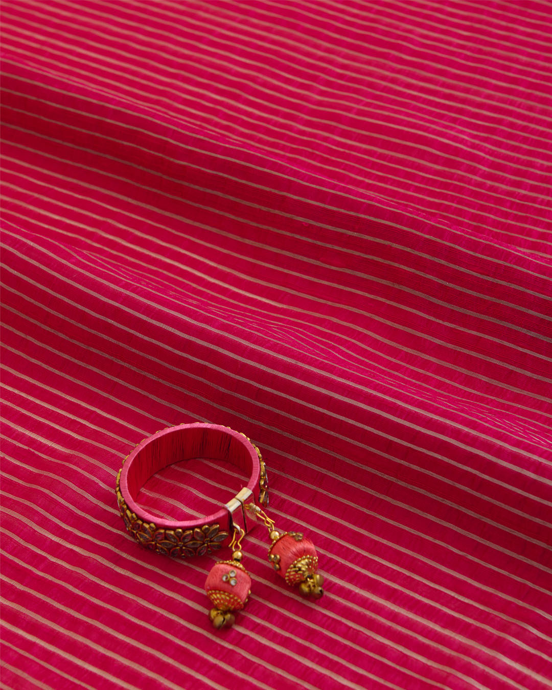 Rani Pink Raw Silk Fabric with Silver Zari Strips and Satin Border