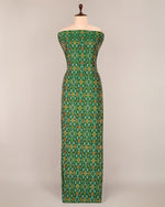 Bottle Green Cotton Silk Ikat Fabric with intricate woven pattern