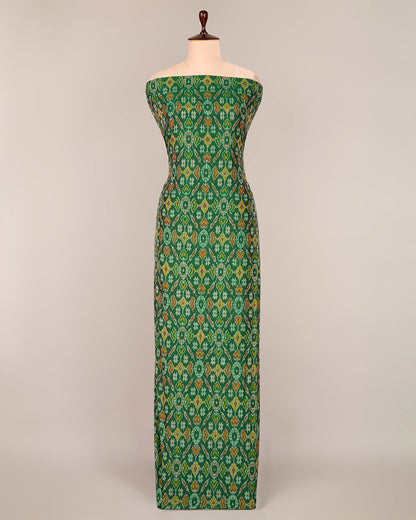 Bottle Green Cotton Silk Ikat Fabric with intricate woven pattern