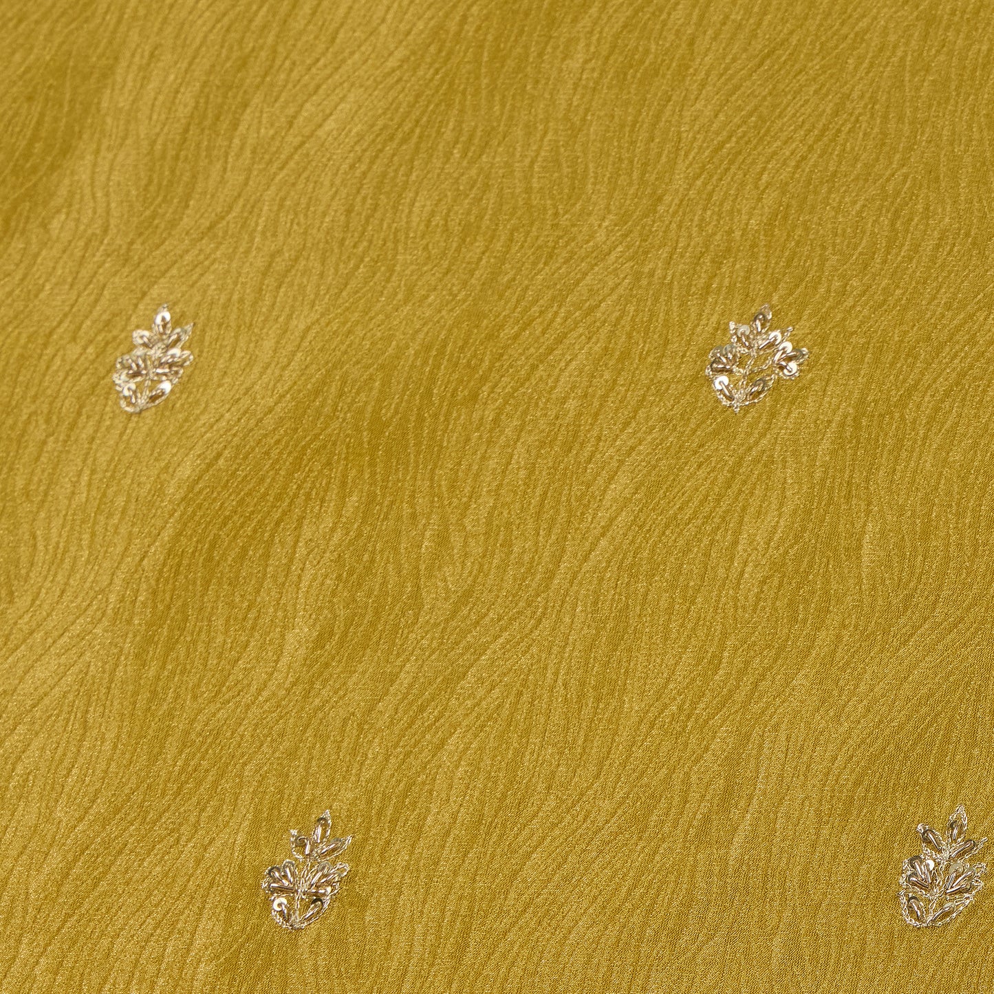 Gold fabric with small leaf patterns