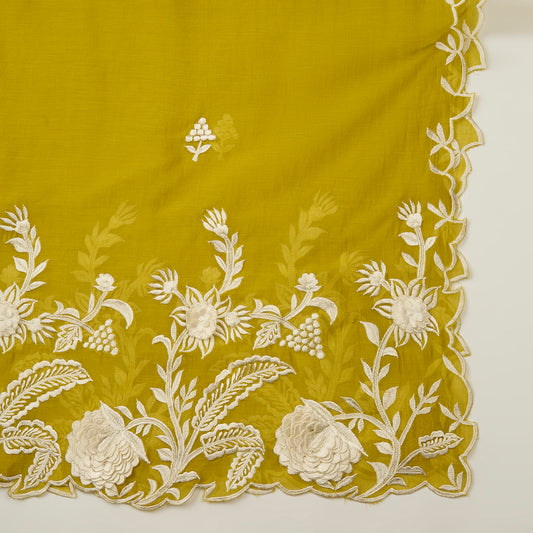 Mustard yellow fabric with white floral embroidery