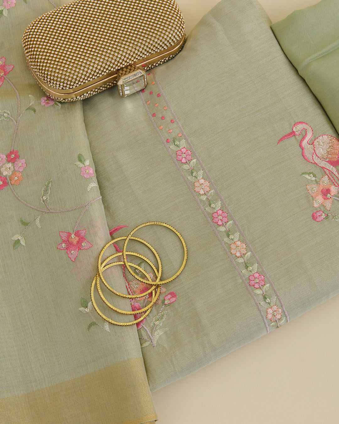 Tissue Chanderi kurta with resham and zari embroidery in daman and all-over bitta, matching dupatta, plain Shantoon bottom, pista green