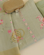 Tissue Chanderi kurta with resham and zari embroidery in daman and all-over bitta, matching dupatta, plain Shantoon bottom, pista green