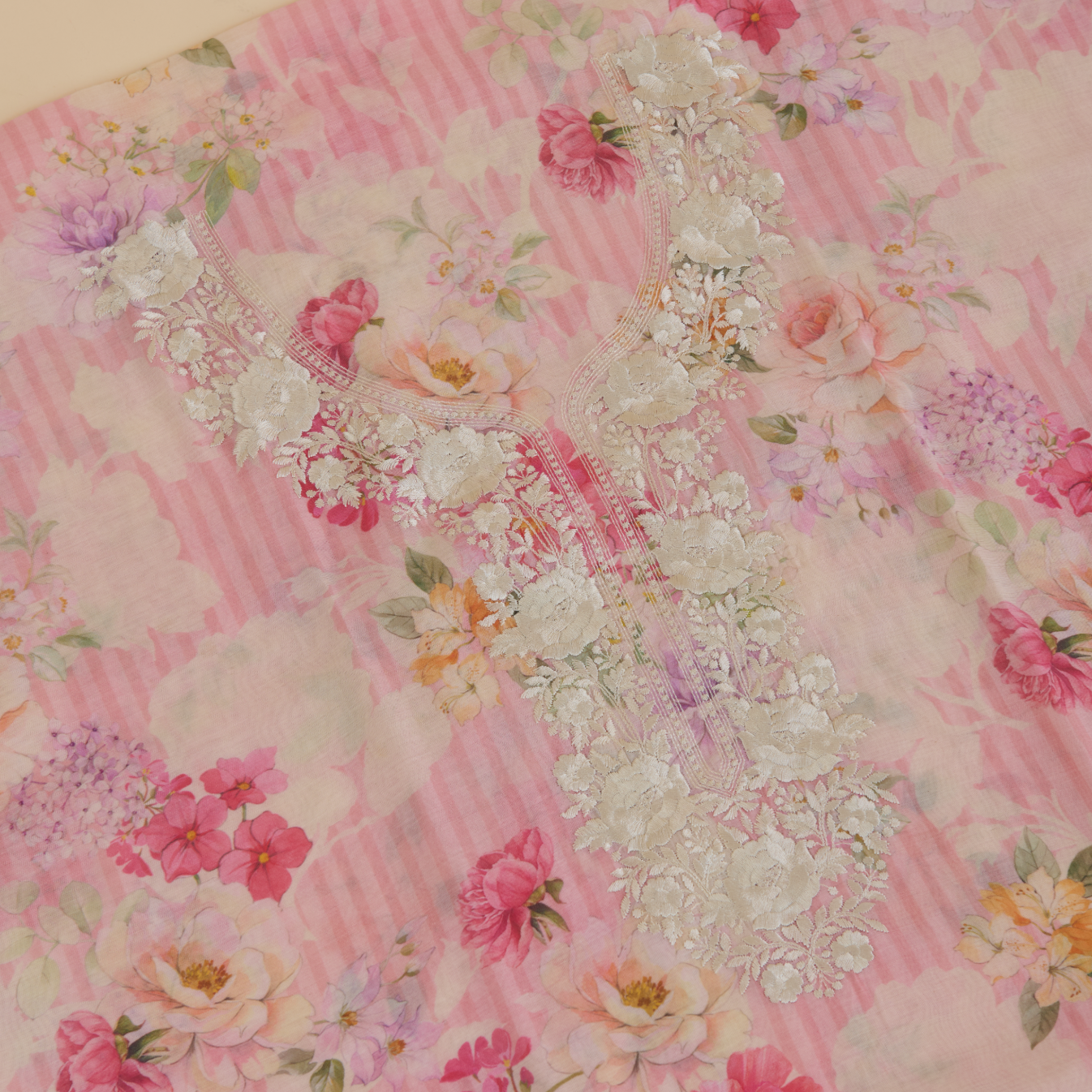 Peach Fine Chanderi Printed Suit with Resham Embroidered Neck