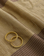 Antique Gold Muga Tissue Fabric with Silver Zari Patta