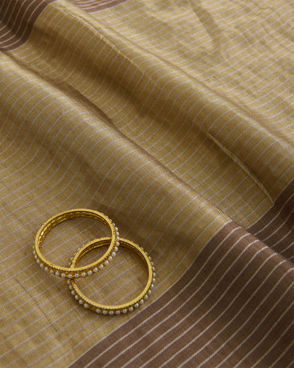 Antique Gold Muga Tissue Fabric with Silver Zari Patta