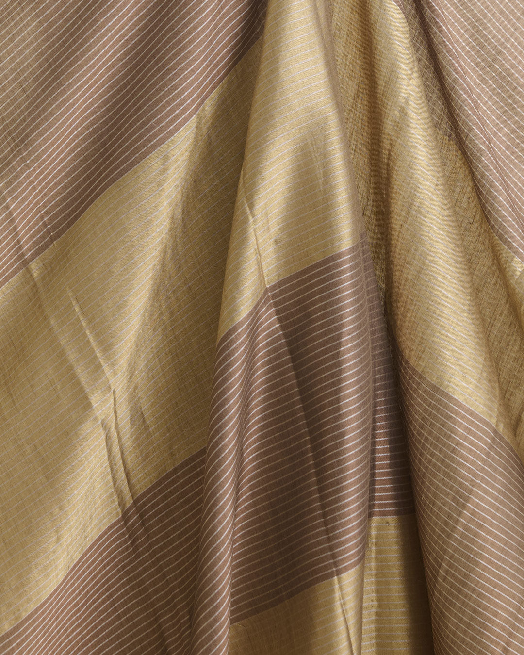 Antique Gold Muga Tissue Fabric with Silver Zari Patta