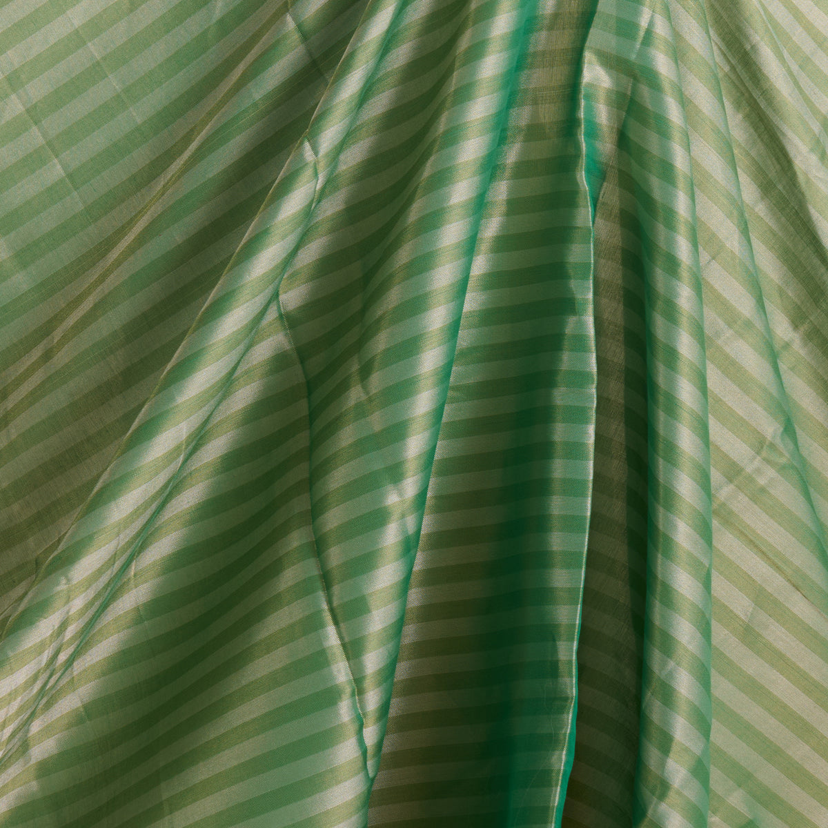 Pista Green Muga Tissue Handloom Fabric
