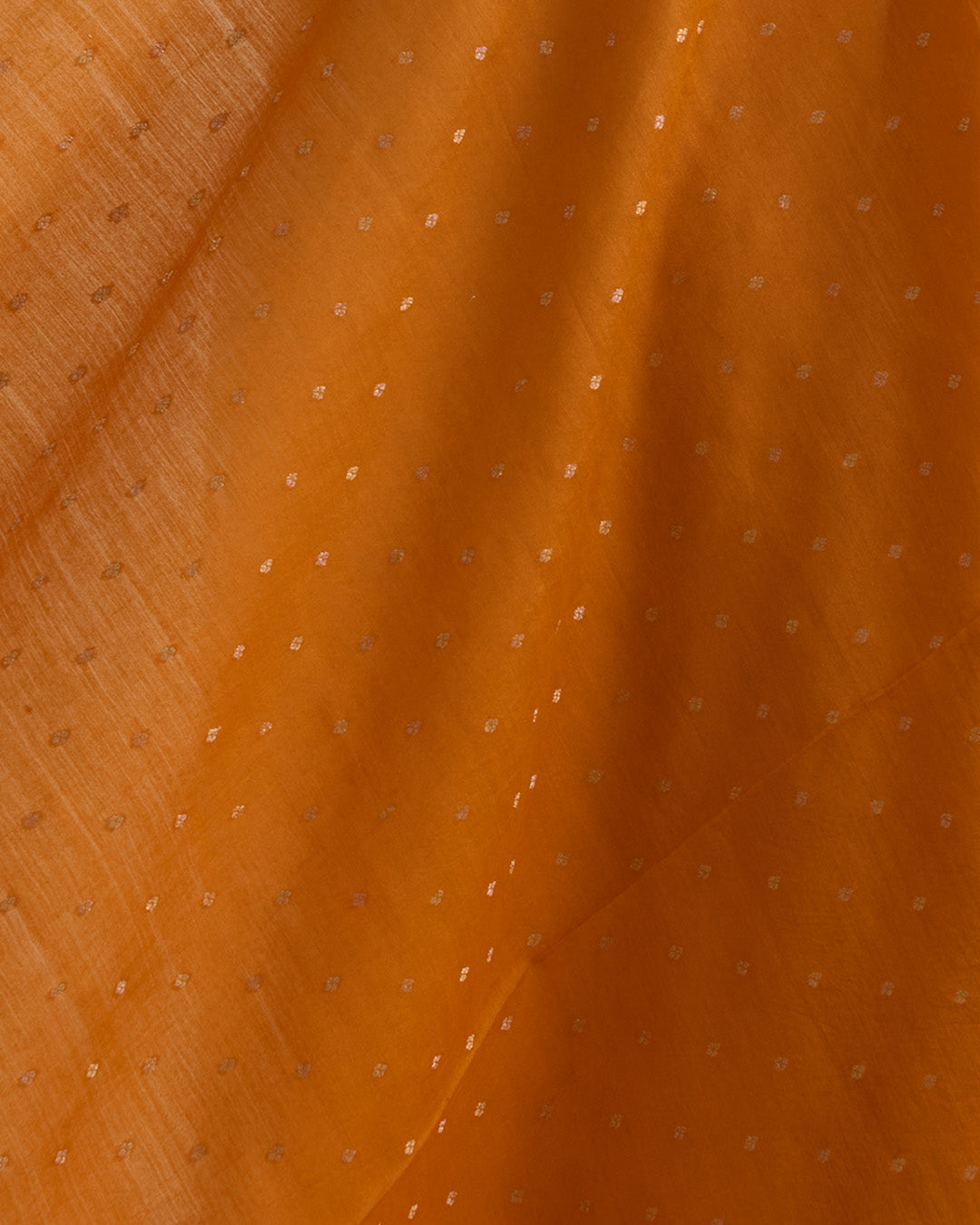 Orange Spun Tussar Gold Silver Zari Buta Woven Fabric